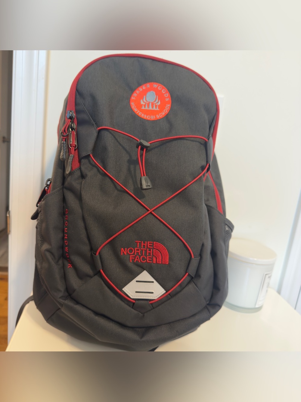 The North Face Black Backpack with Red Accents - Outdoor Daypack